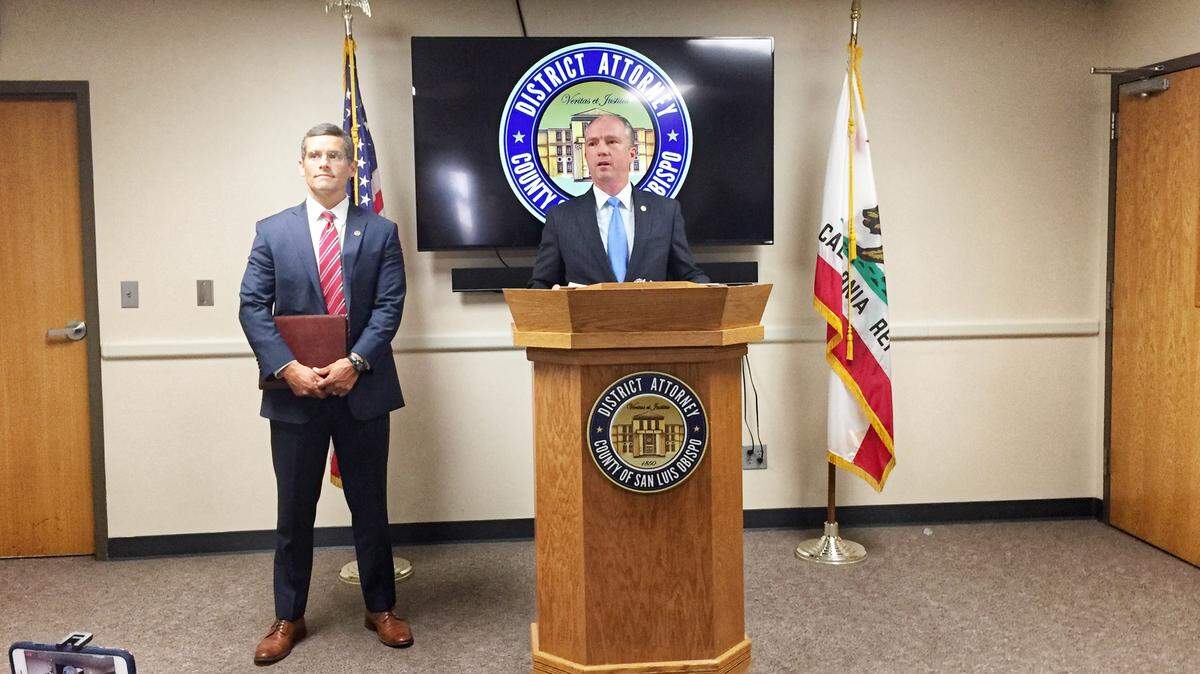 Assistant District Attorney Eric Dobroth, left, and District Attorney Dan Dow hold a news conference in November 2018 to discuss their decision not to charge former Paso Robles police officer Chris McGuire with sexual assault charges.