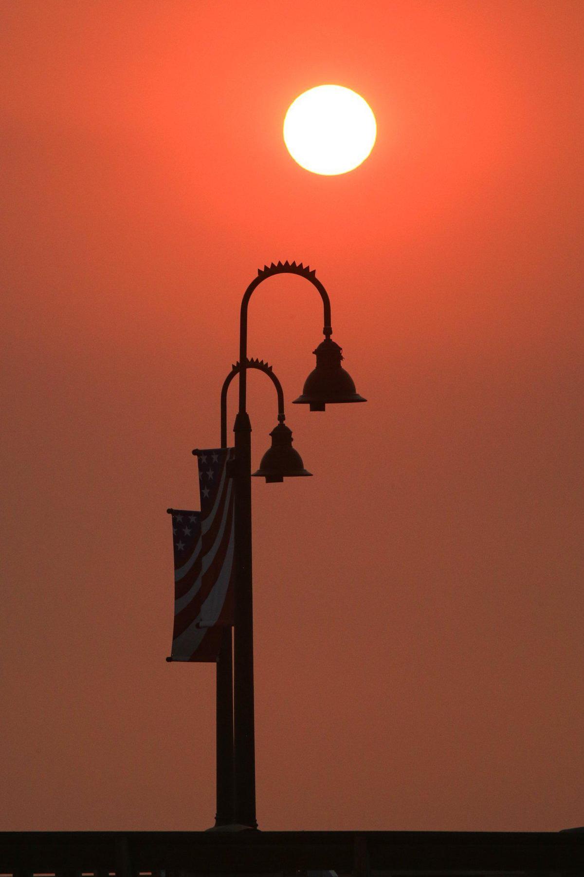 New lights are seen on the remodeled Pismo Pier at sunset on Tuesday, Aug. 18, 2020.