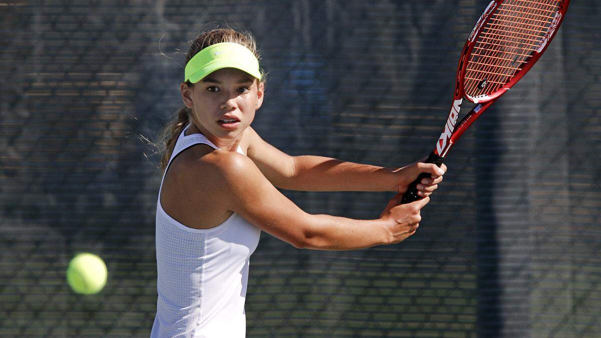 Arroyo Grande's Delanie Dunkle makes a return against San Luis Obispo's McKenzie Burkshire during Thursday's tennis match. Dunkle won all three of her sets 6-0 against the Tigers.