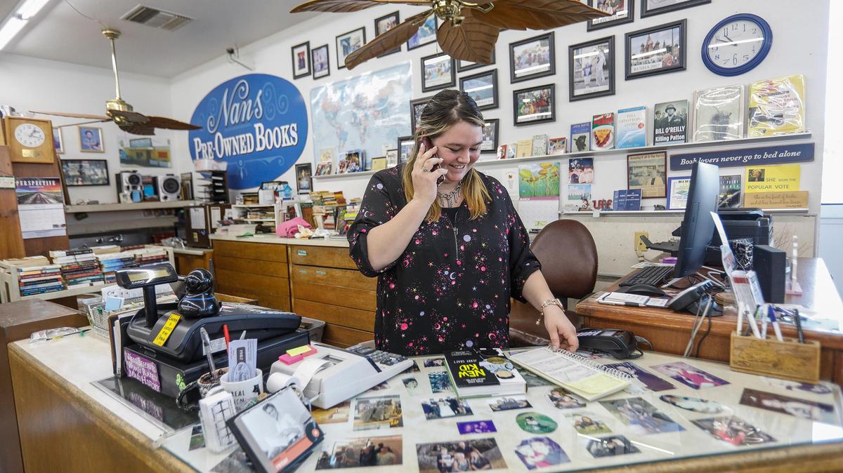 Nan’s Pre-owned Books in Grover Beach is one of several participating businesses. Co-owner Kassi Dee takes orders over the phone in 2020.
