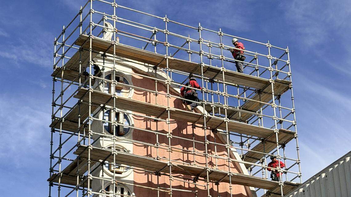 Workers set up scaffolding around the damaged Fremont Theater sign on Wednesday Feb. 25, 2026, in downtown San Luis Obispo.