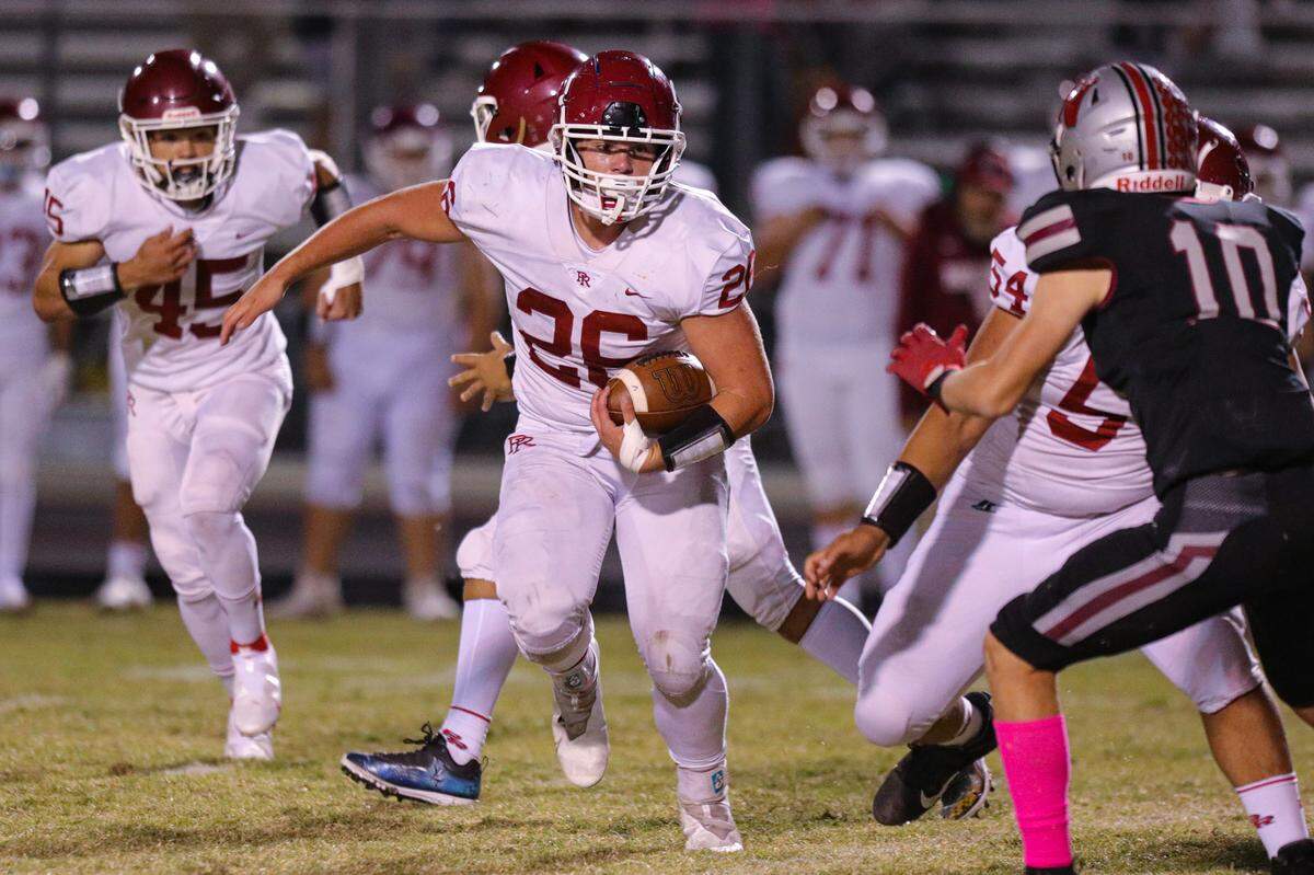 Leo Kemp runs with the ball. Nipomo hosted Paso Robles in a Mountain League football match up.