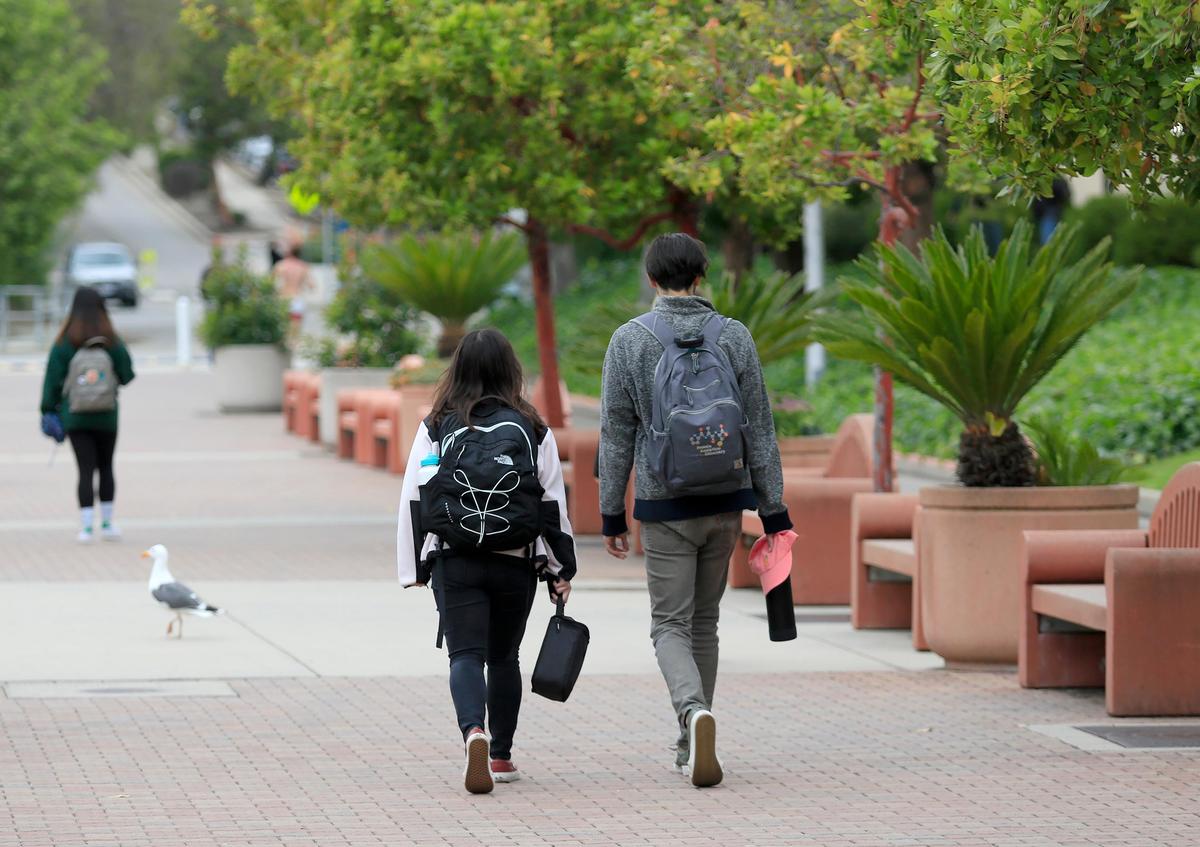Cal Poly students walking through campus.