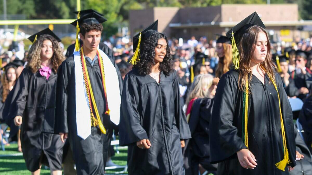San Luis Obispo High School seniors walk to the stage to receive diplomas during commencement ceremonies at Holt Field on Friday, June 5, 2026. 374 seniors received their diplomas.