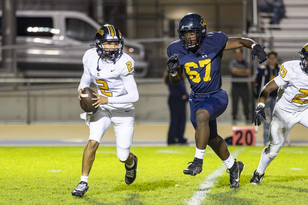 Arroye Grande defender Trace Green chases a Sunnyside High player in a 62-14 win.