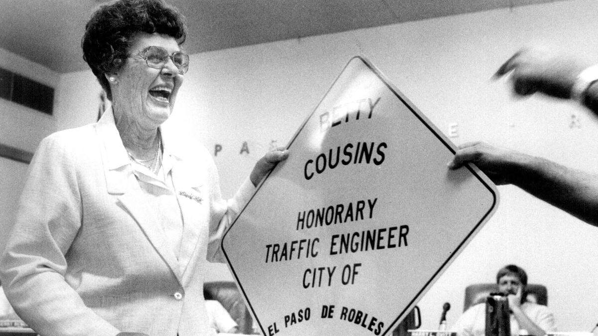 Outgoing Paso Robles City Councilwoman Betty Cousins received a street sign naming her an honorary traffic engineer as she completed her term in 1988.