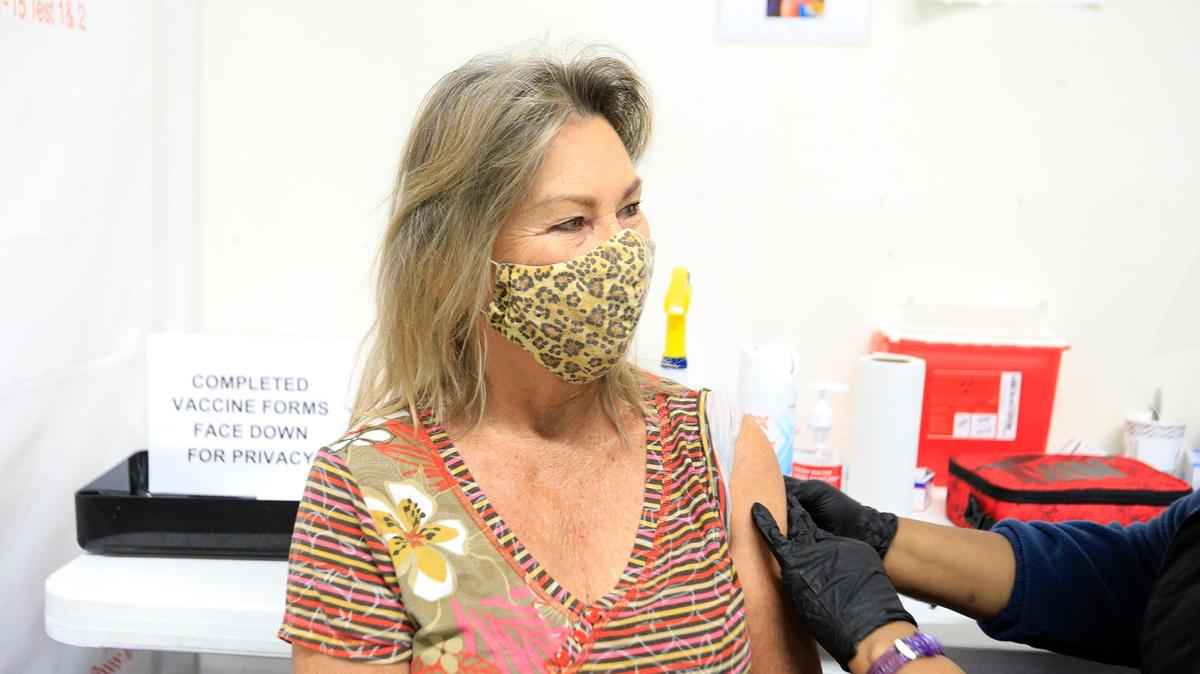 Susan Brownlee of Paso Robles receives her first COVID-19 shot at a coronavirus vaccination site at Paso Robles Event Center. It’s run by the San Luis Obispo County Public Health Department.