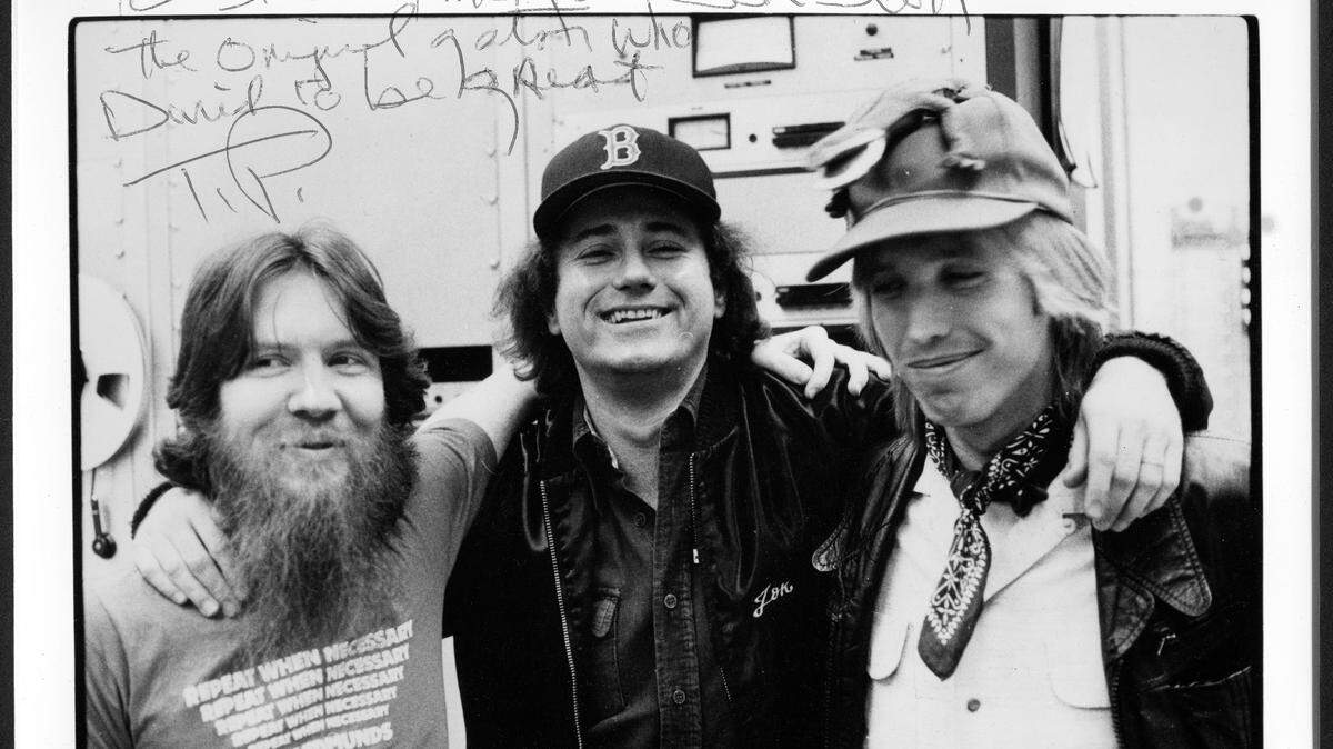 Jon Scott (middle), the author of “Tom Petty and Me,” with Tom Petty and “D.J. Redbeard,” the program director of ROCK 103 radio station in Memphis in 1977.
