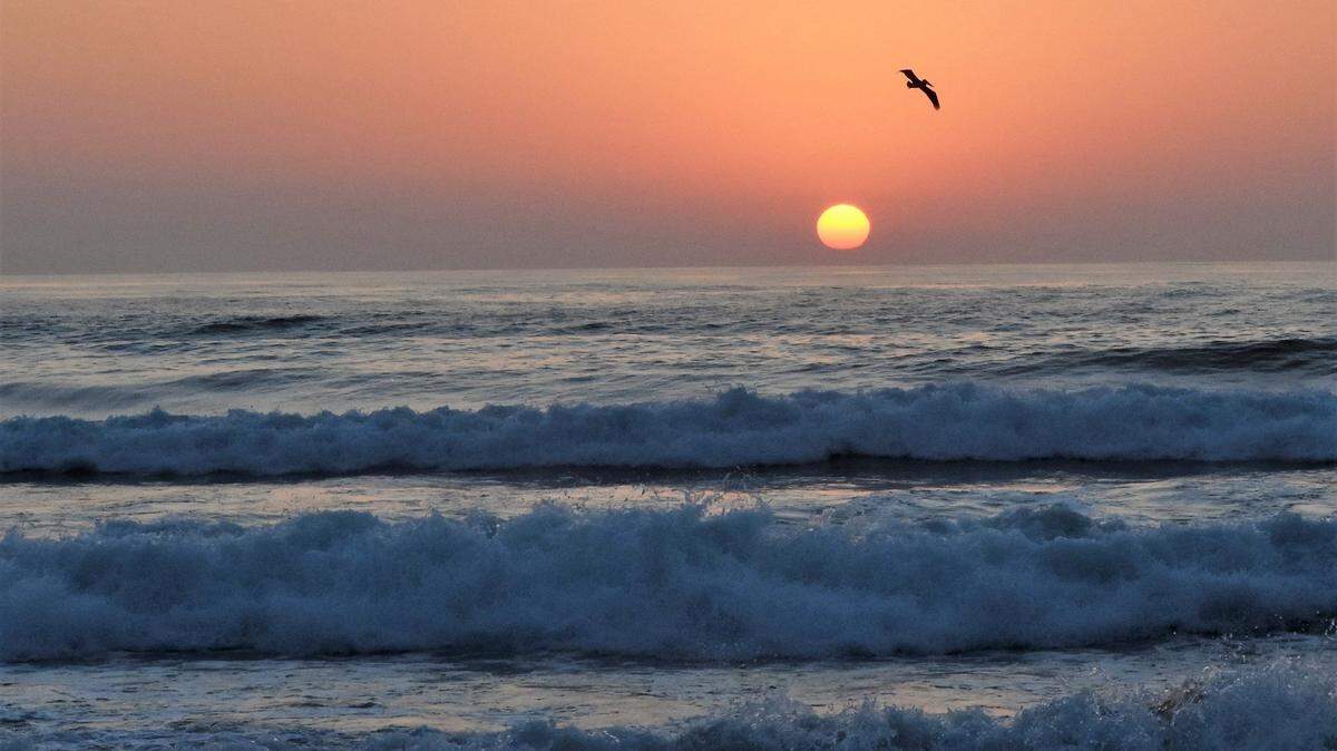 A view of a beautiful sunset over the Big Sur coastline.