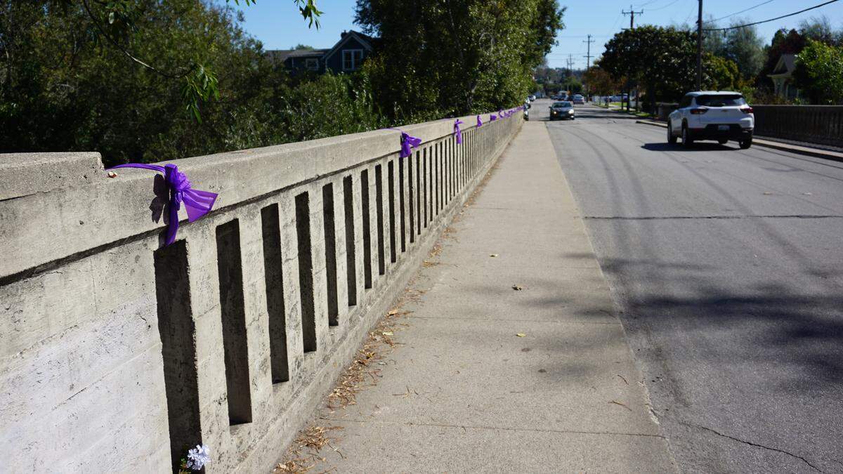 Purple ribbons are attached to posts and signs in the Arroyo Grande Village in honor of Kristin Smart and ahead of the verdicts in the Paul Flores murder trial.