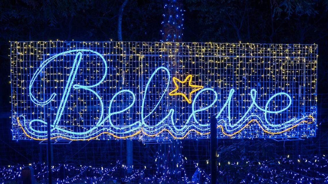A sign reading "Believe" made of Christmas lights shines at the Cambria Christmas Market on Friday, Nov. 21, 2025. The annual Christmas market will open its doors on Nov. 29, 2025.