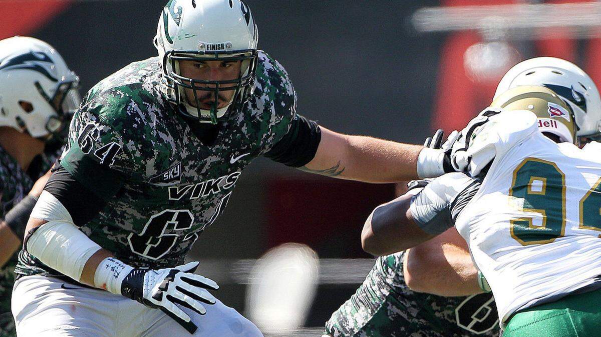 Portland State offensive tackle and former Paso Robles High standout Mitchell Van Dyk (64) was chosen by the St. Louis Rams in the seventh round of the NFL Draft on Saturday.