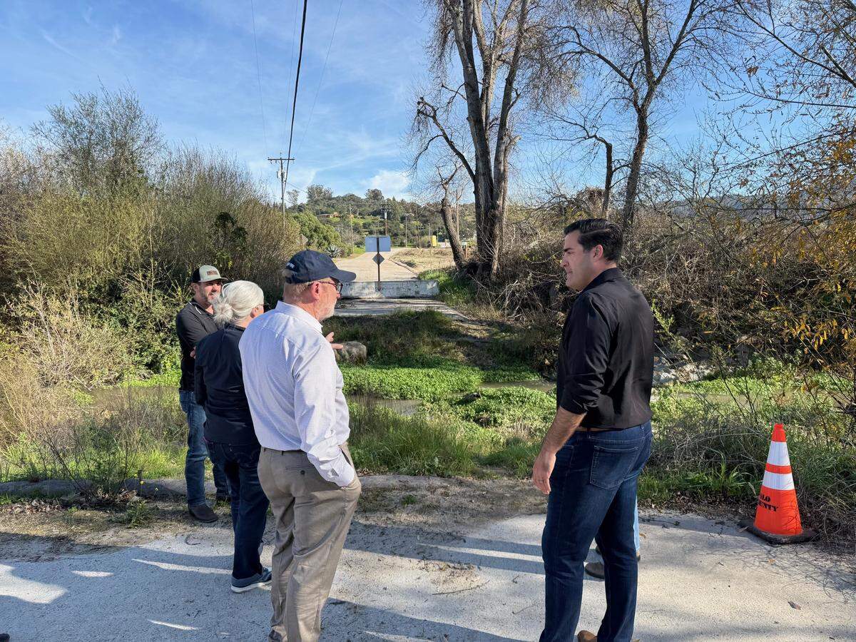 Supervisor Jimmy Paulding and State Senator John Laird during a visit to Cecchetti Road near Arroyo Grande in February.
