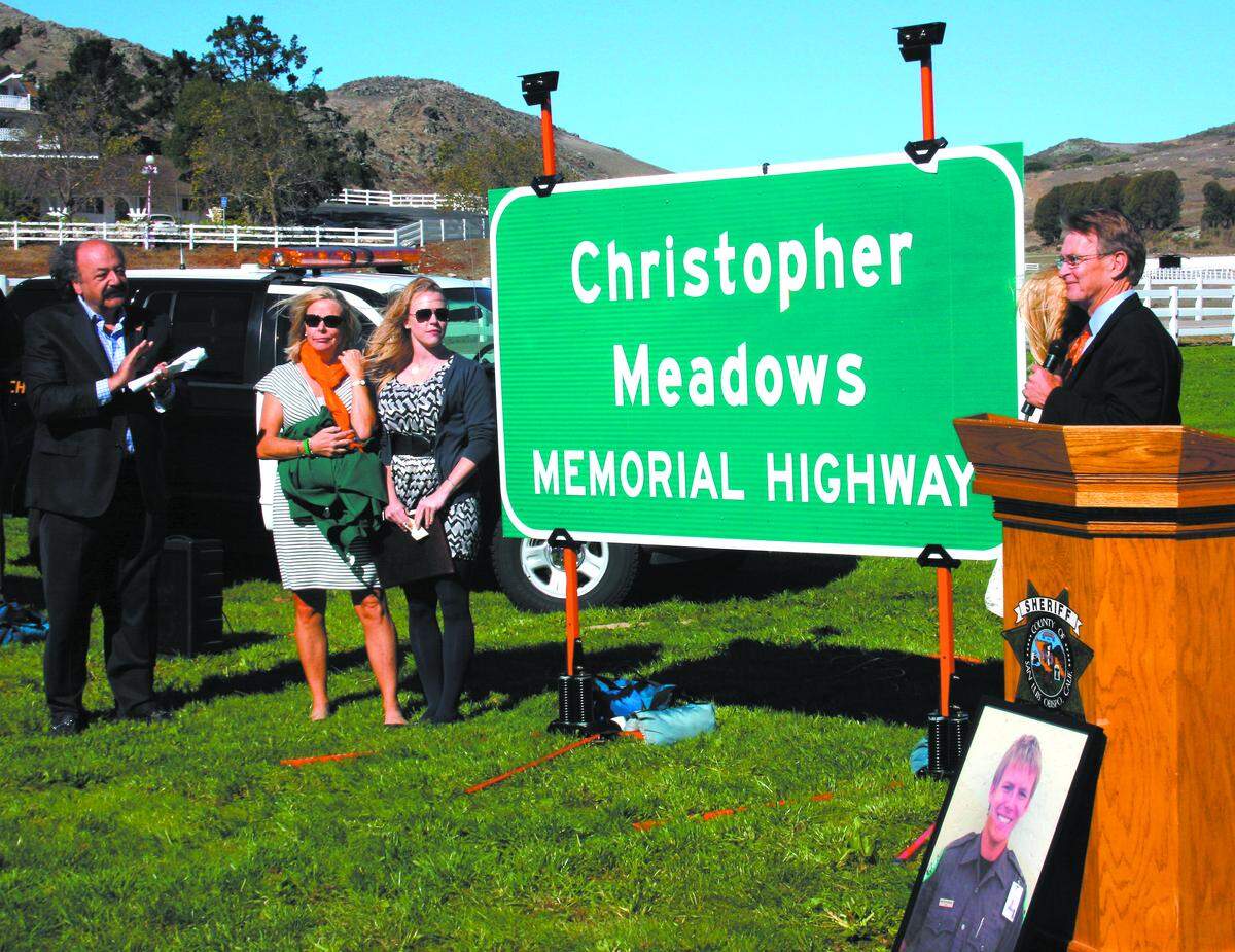 Katcho Achadjian, Chris’ mother, Mardy Meadows; sister, Kelly Meadows; sister Jen Meadows; and father, Tim Meadows at the dedication of the Christopher Meadows Memorial Highway in 2013.