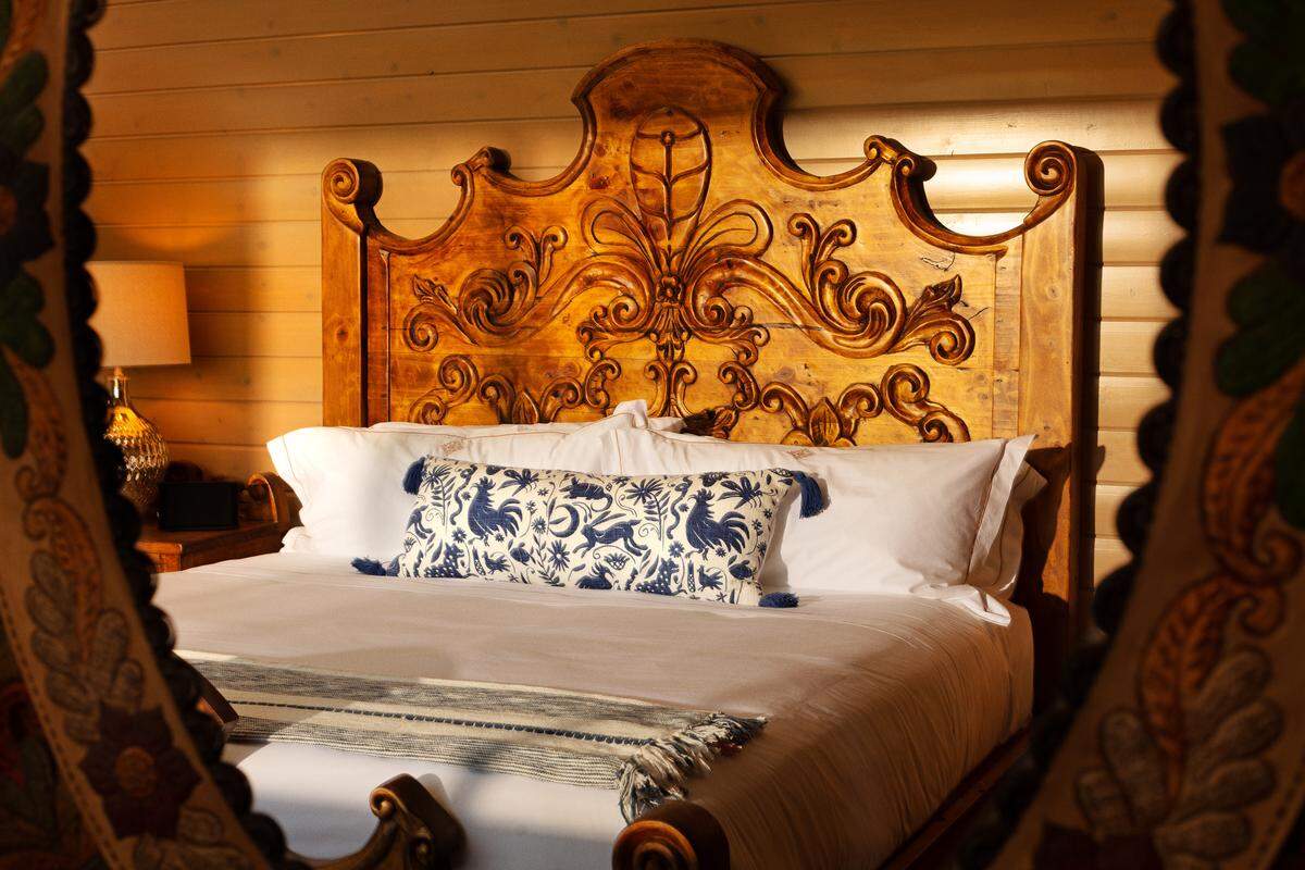 Furniture at San Luis Obispo’s La Lomita Ranch features a European influence with elegant lines and hand-carved details.