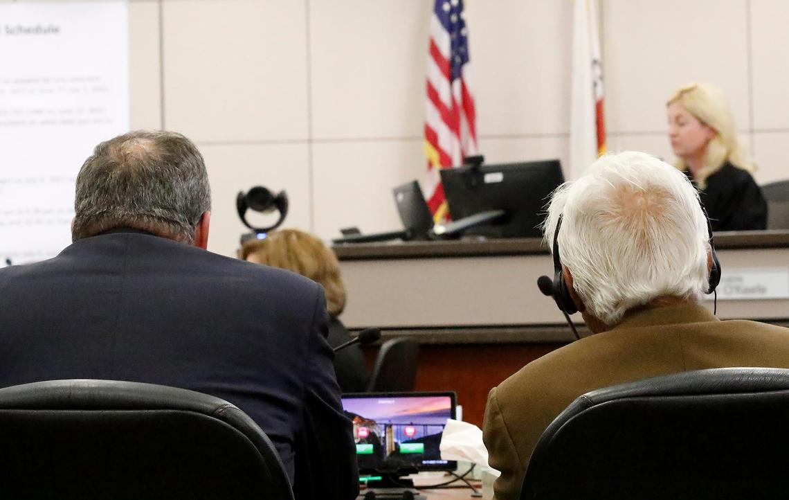 Ruben Flores, right, and his attorney Harold Mesick watch the proceedings as Judge Jennifer O’Keefe announced that his jury had reached a verdict on Oct. 17, 2022, in the Kristin Smart murder case. The verdict will remain sealed until the Paul Flores verdict is determined.