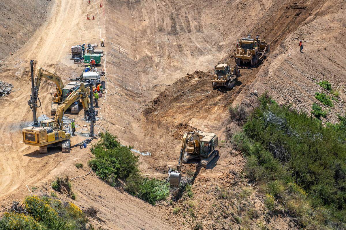 Various pieces of equipment are among the tools Caltrans is using to reopen the Regent’s Slide area of Highway 1. Caltrans is estimating a March 2026 reopening if all goes as expected.