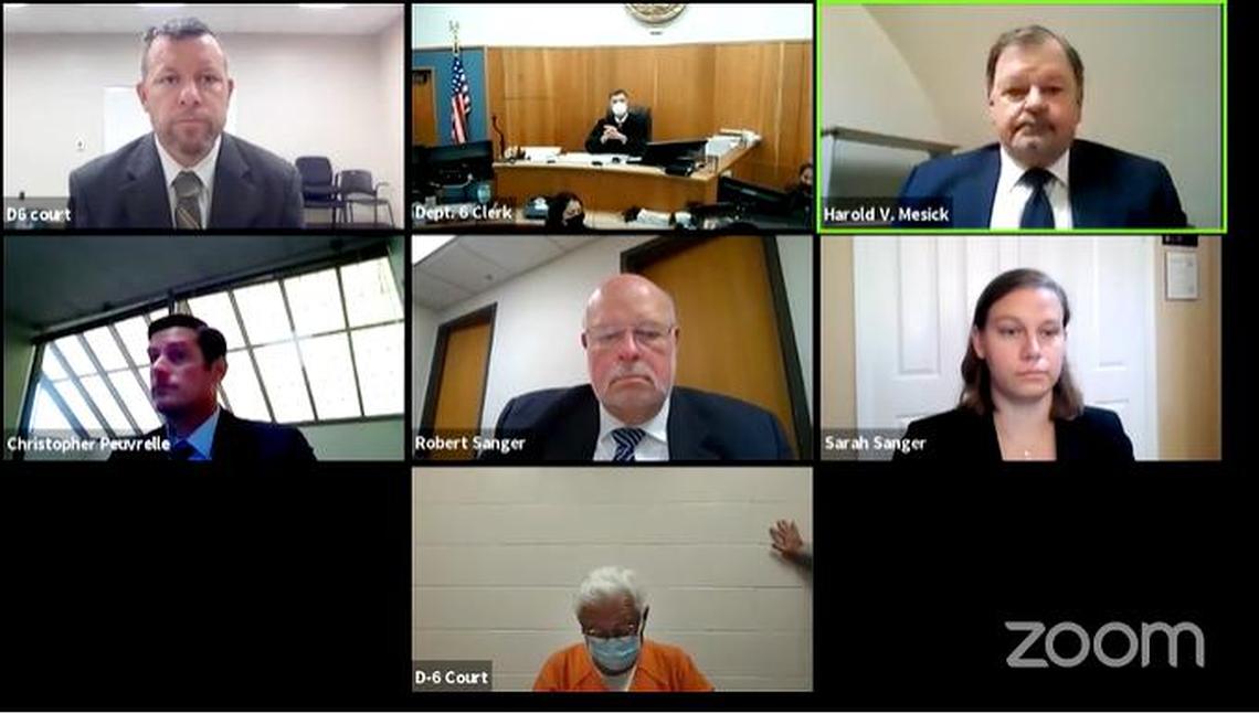 Paul Flores, upper left appears at his arraignment. He was taken into custody in San Pedro and booked into San Luis Obispo County Jail on suspicion of the murder of Kristin Smart. At center top is Judge Craig van Rooyen. Upper right is Harold Mesick, attorney representing Ruben Flores. Center left is Deputy District Attorney Chris Peuvrelle. Center is Robert Sanger, center right is Sara Sanger, both representing Paul Flores. Bottom frame is Ruben Flores, father of Paul, charged as an accessory to murder.