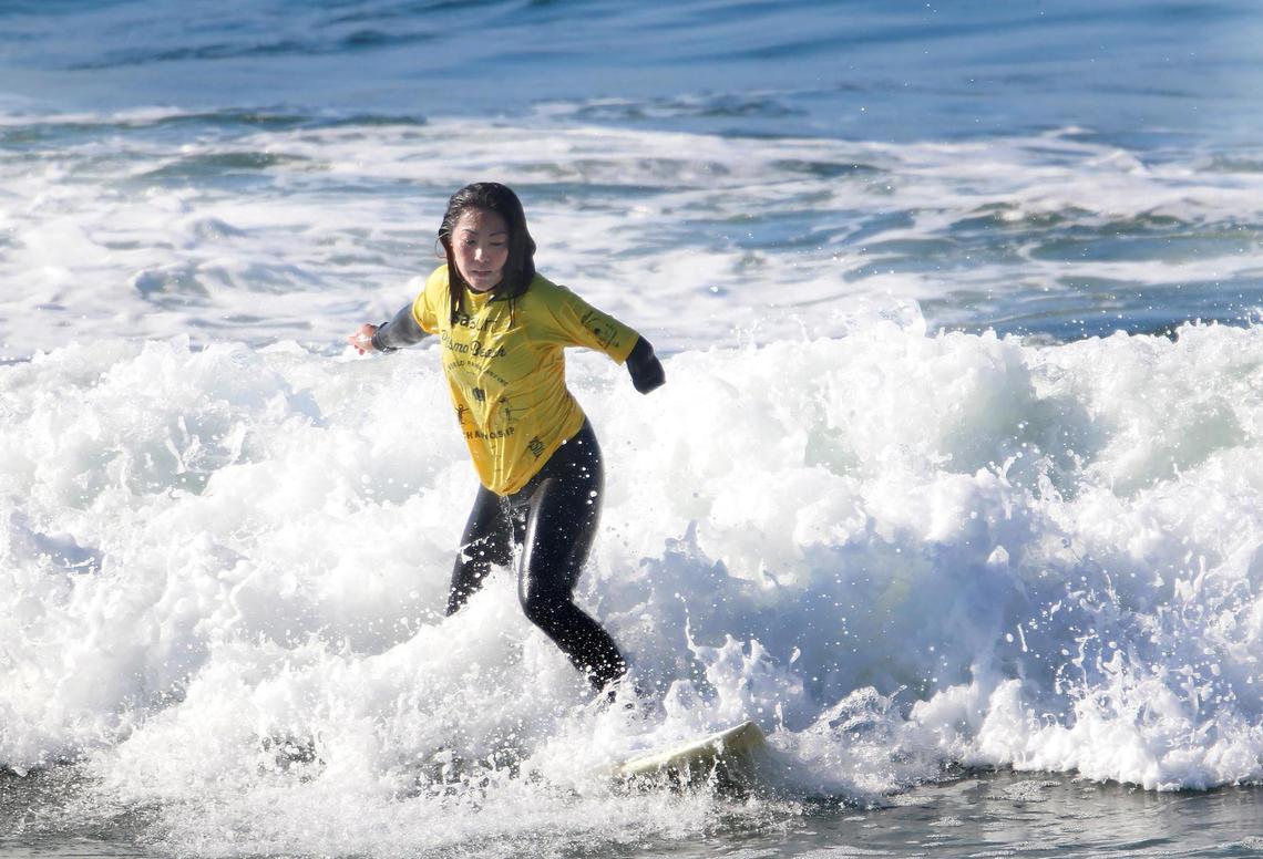 Chikato Takao, of Japan, competes in the Round One, Stand 1 portion of the women’s. The world’s largest para surfing competition takes place in Pismo Beach through Dec. 11.