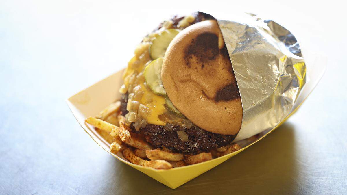 Mosey's Burgers on Main St. in Morro Bay Double smashburger , fresh cut seasoned fries in tallow, seen here on Jan. 28, 2026. 