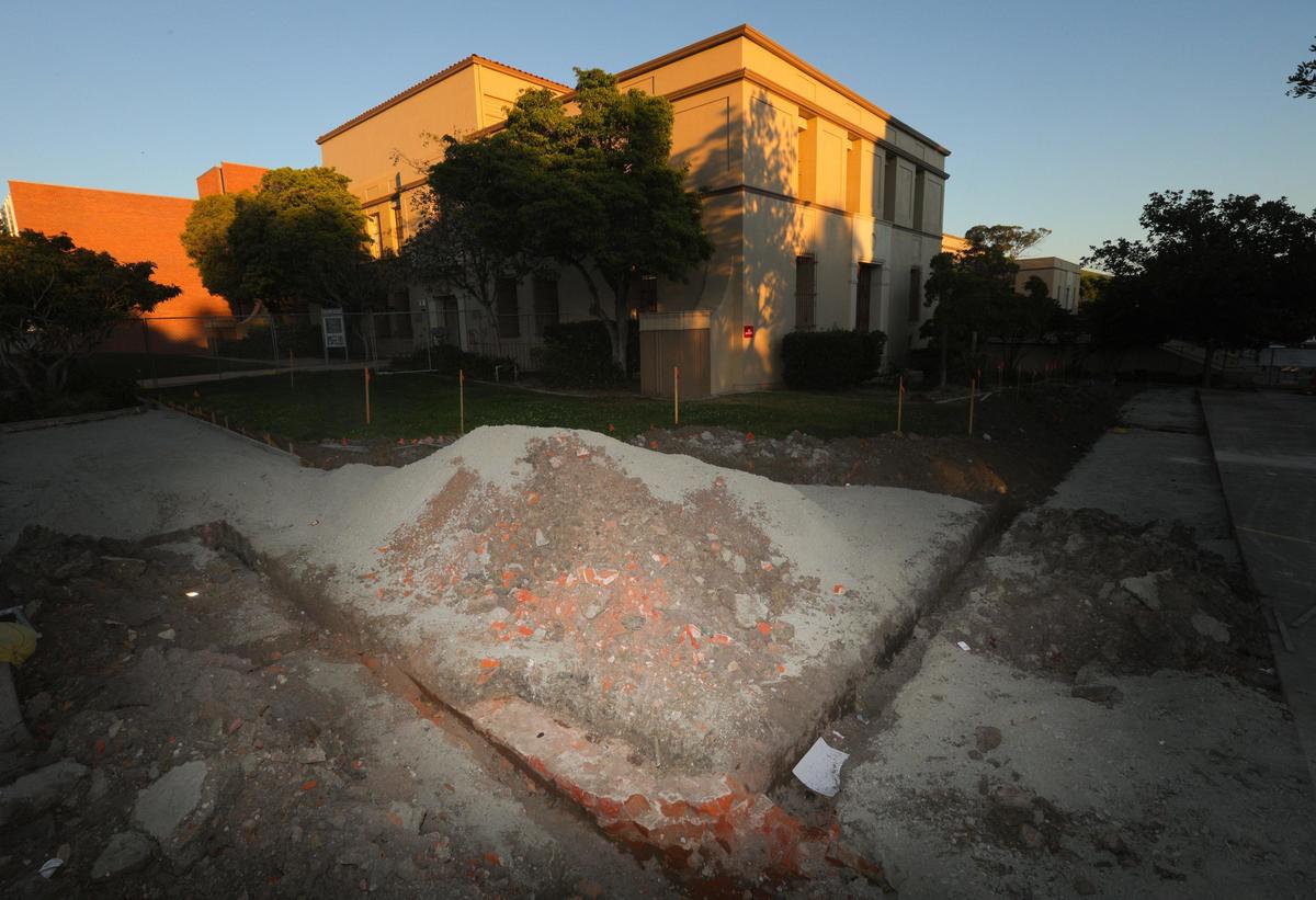 Remains of the 1888 Hall of Records in San Luis Obispo are seen in the foreground. The building was demolished in 1940 to make way for the Civic Moderne-style courhouse building in the background.