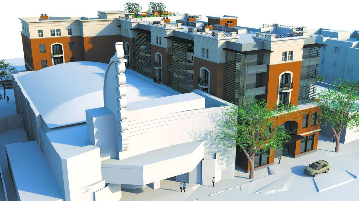 A rendering of the proposed building that would wrap around the Fremont Theater and span Monterey Street to Higuera Street.