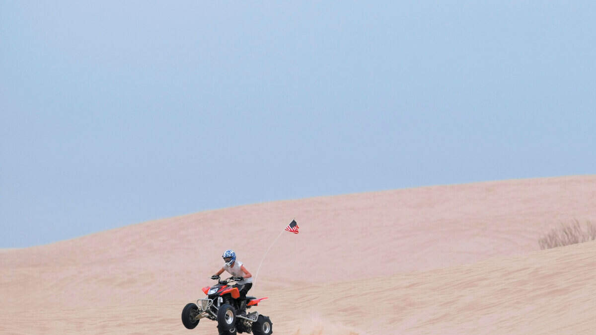 An ATV rider at the Oceano Dunes.