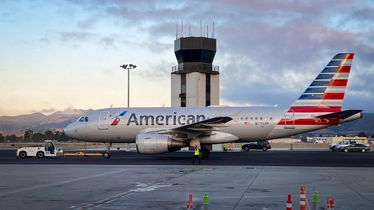An American Airlines Airbus A319-112 on a flight for Phoenix is towed from the gate at the San Luis Obispo County Regional Airport the morning of July 16, 2024.
