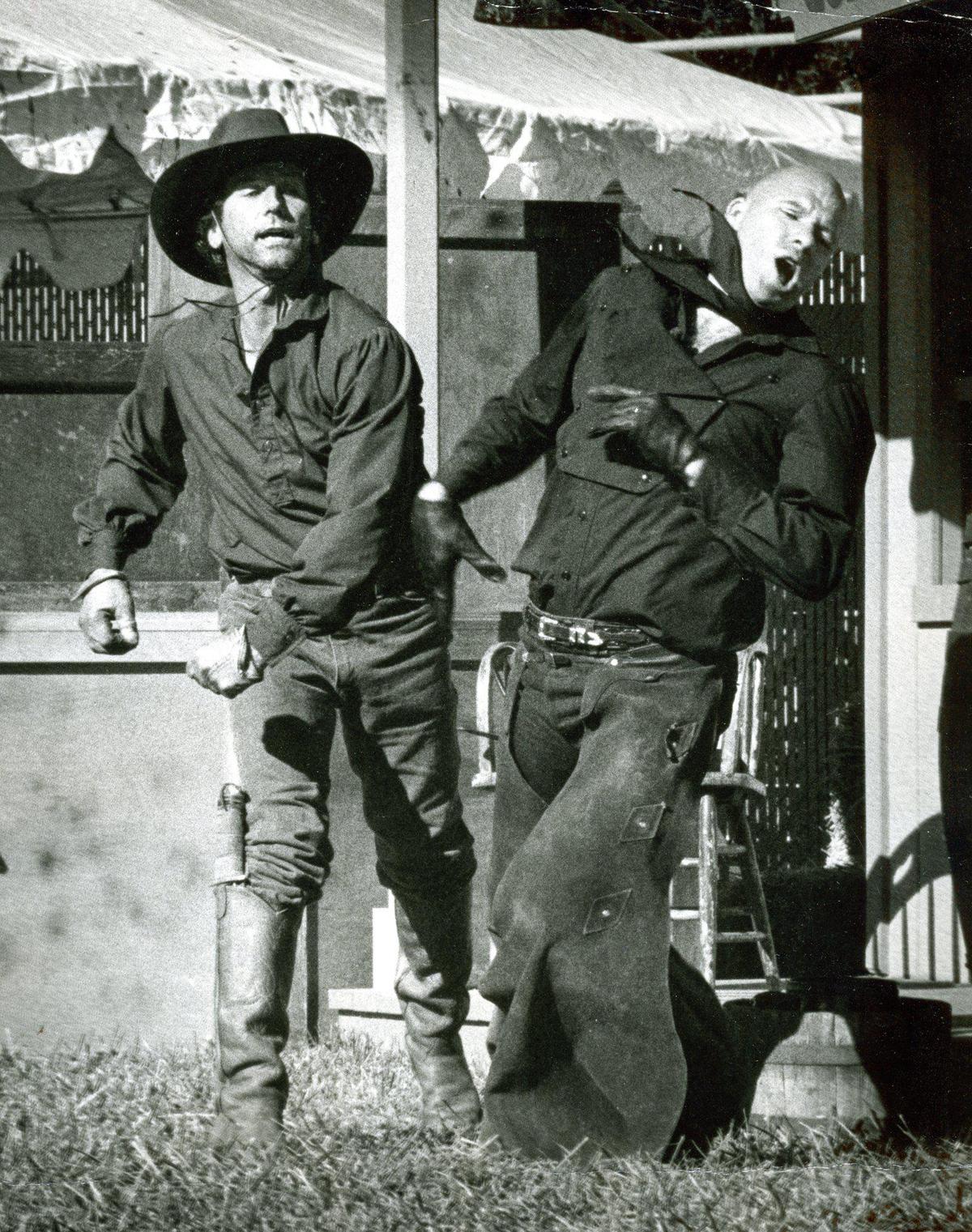 Jim Poslof, left, and John Grantham are making a big hit with fairgoers with their Western brawl.