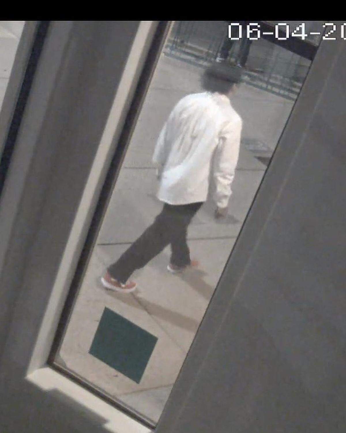 A person suspected of vandalizing three separate businesses in downtown San Luis Obispo in a security camera image provided by the San Luis Obispo Police Department.