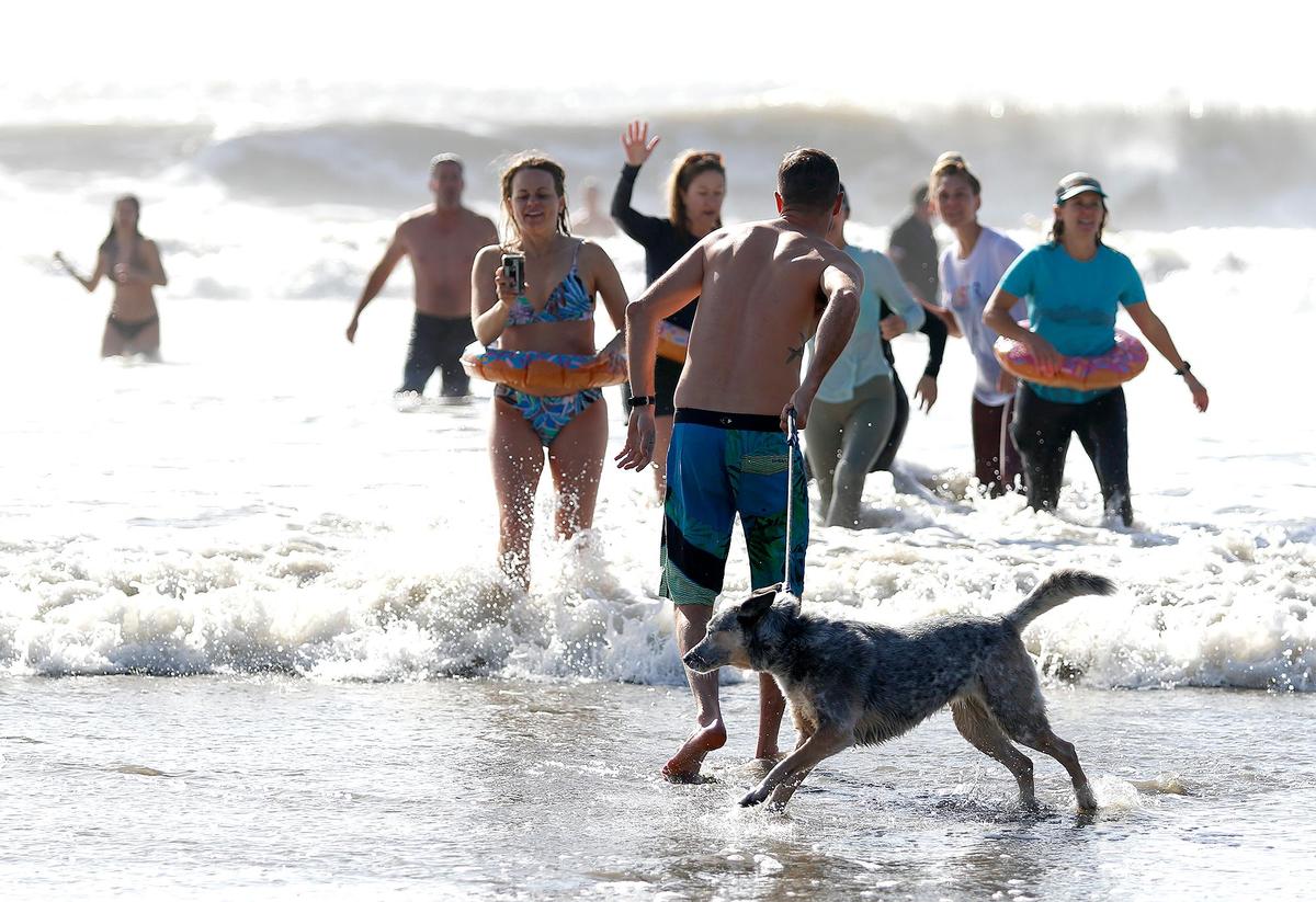 The 43rd Carlin Soule Memorial Polar Bear Dip invites community members to don swimsuits and silly costumes before welcoming the new year by running into the waves.