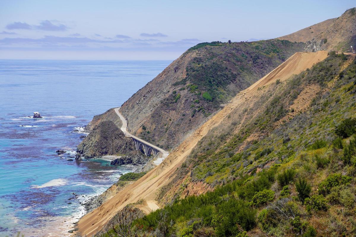 Regent’s Slide covers part of Highway 1 on the Big Sur coast, pictured Thursday, July 17, 2025. Regent’s Slide closed Highway 1 around 27 miles north of the San Luis Obispo-Monterey county line in February 2024.
