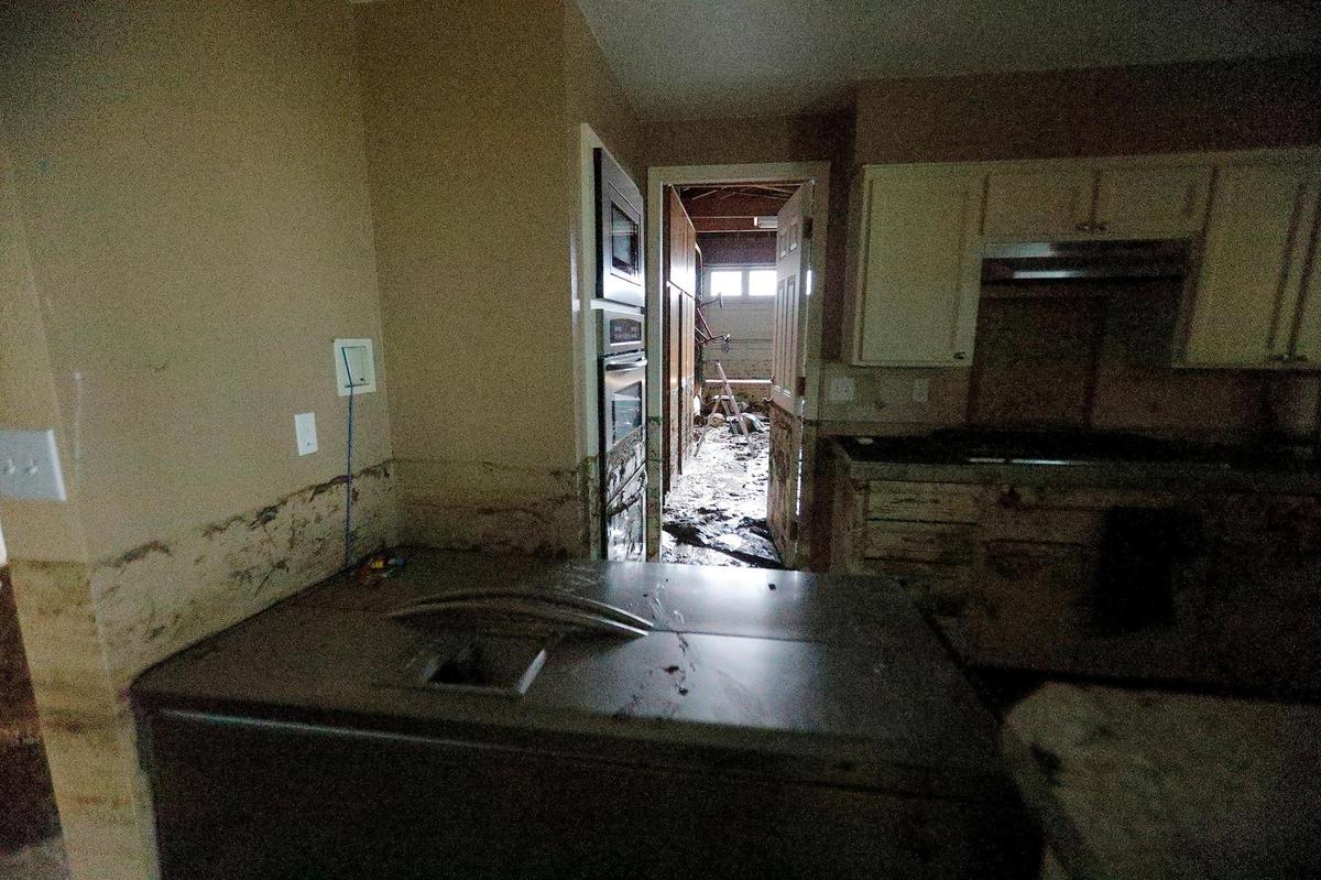 One home on Vista Court in Los Osos was hit particularly hard when a water retention basin failed on Monday, Jan. 9, 2023, sending a wall of floodwater through the house, up to three feet on the walls. It even knocked over the refrigerator, and every room and the front and back yard were damaged.