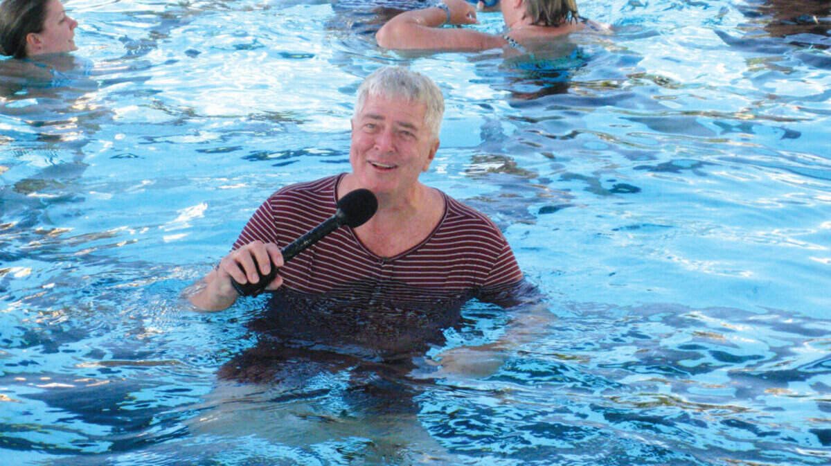 Huell Howser swims in the Neptune Pool at Hearst Castle in 2009.