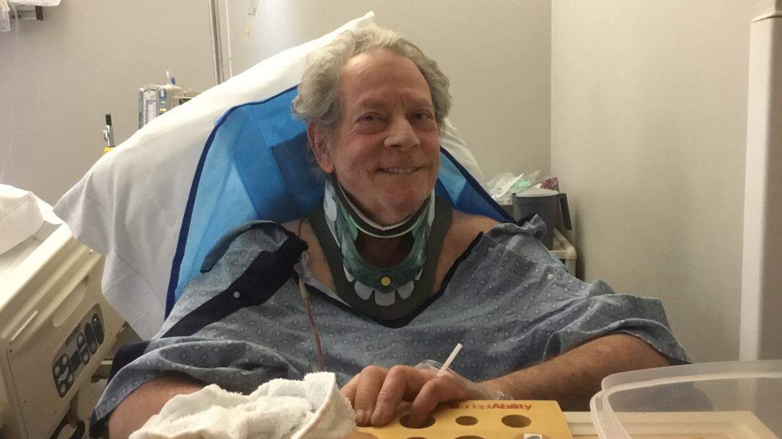 Big Sur artist Peter Fels poses for a photo on Friday, Jan. 20, 2023, after undergoing neck surgery at Sierra Vista Regional Medical Center in San Luis Obispo. A California National Guard helicopter transported the sculptor to the hospital.