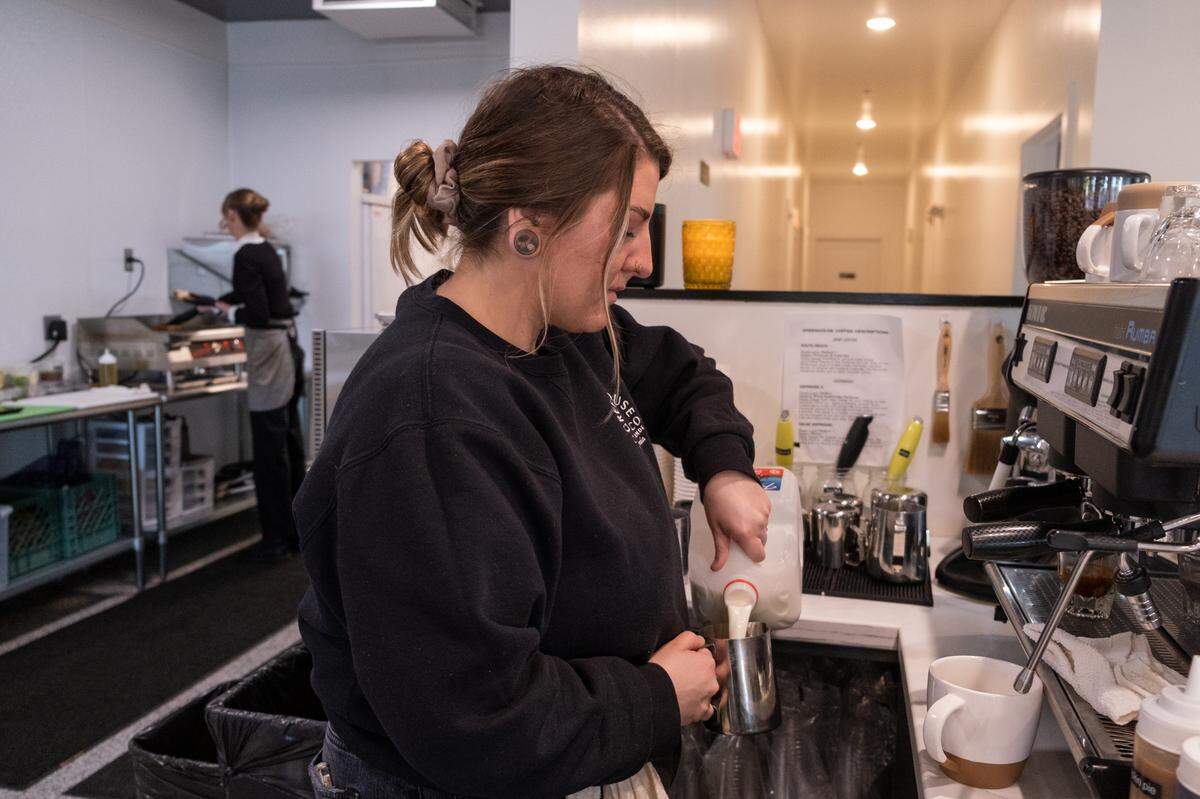 Barista Makenna makes a latte at Greenhouse Coffee Co. in Arroyo Grande on Jan. 21, 2023.