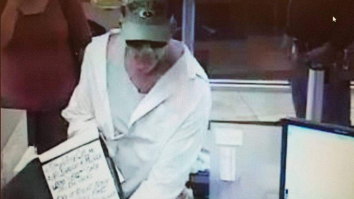 Surveillance footage shows the man who robbed the Santa Maria Wells Fargo bank Friday morning.