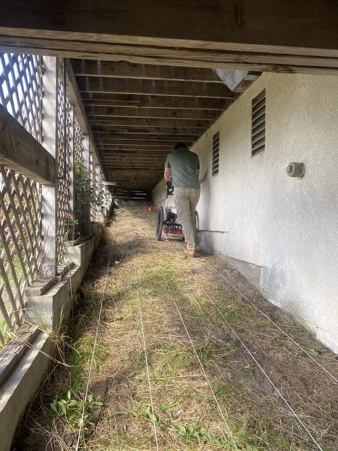 A radar operator examines earth below the Arroyo Grande home of Ruben Flores, father of Paul Flores, who has been named the “prime suspect” in the 1996 disappearance of Cal Poly student Kristin Smart, on March 16, 2021.