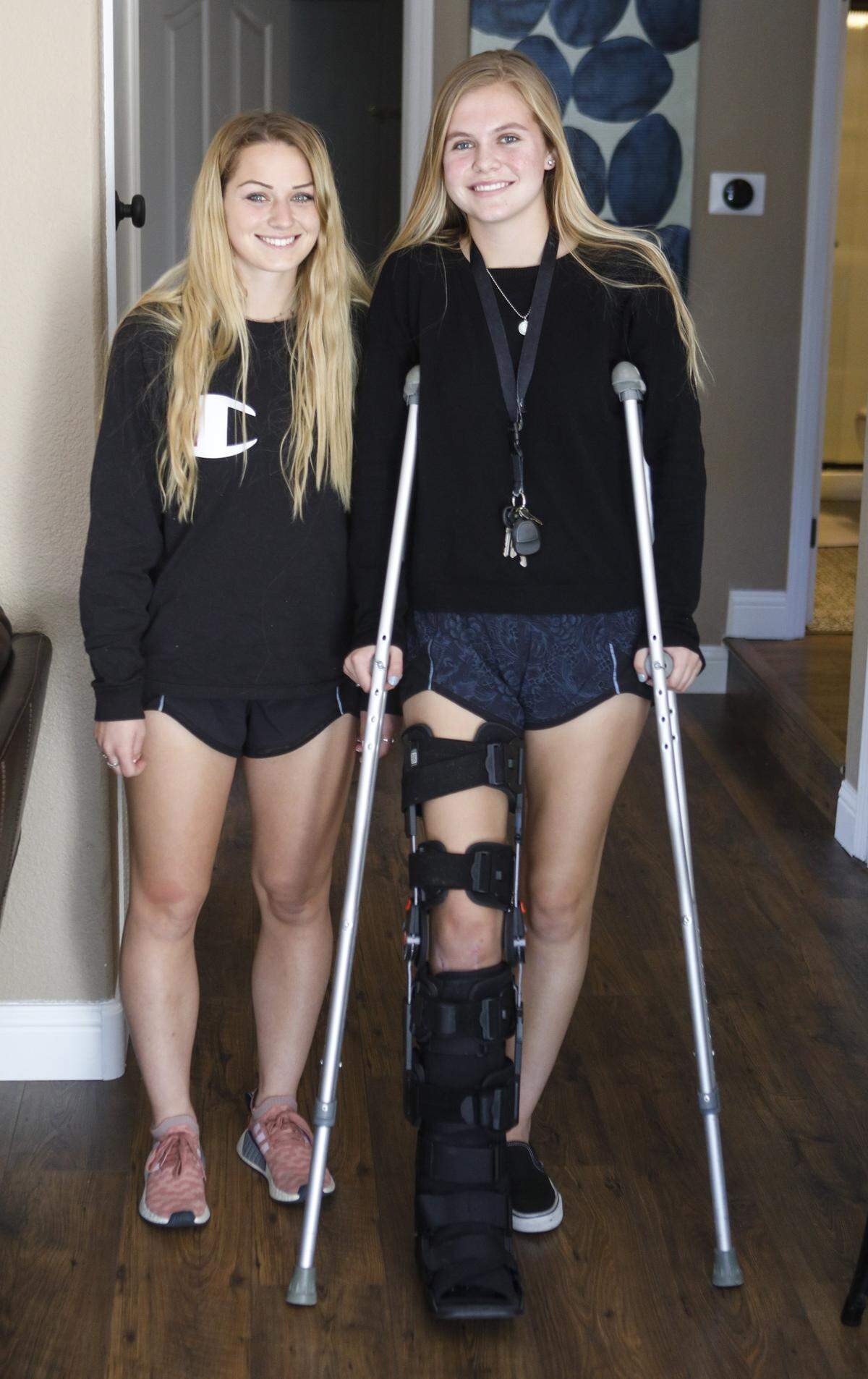 Arroyo Grande High School junior soccer star Allie Palangi broke her leg in a car crash in January. Her friend and soccer rival Emily LeMiere, left, of San Luis Obispo High School, helped get her to the hospital.