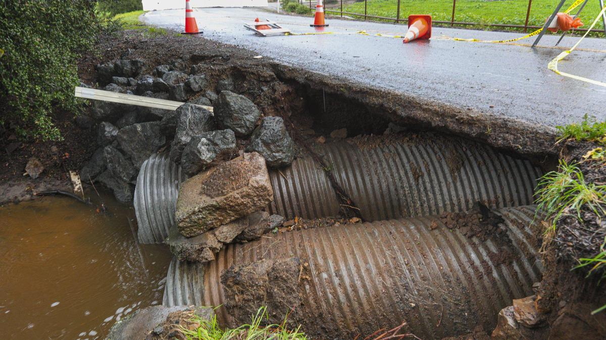 Corbett Canyon Road is closed between Tiffany Ranch Road and Dairy Lane. The road was undermined by stormwater and only the pavement is holding over several feet of air gap above the culvert. Storm updates Jan 16, 2023, as a series of atmospheric river storms hit the coast.
