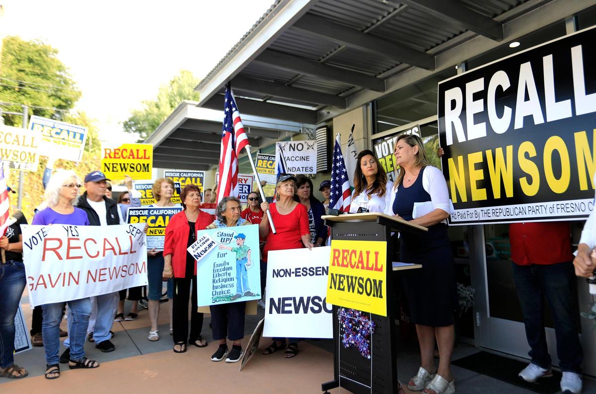 Angela Marsden, owner of Pineapple Hill Saloon & Grill in Sherman Oaks, speaks Thursday during a rally in San Luis Obispo in support of Gov. Gavin Newsom’s recall. The group Rescue California met with a crowd at Dignified Hope Care as on one of several stops through California.