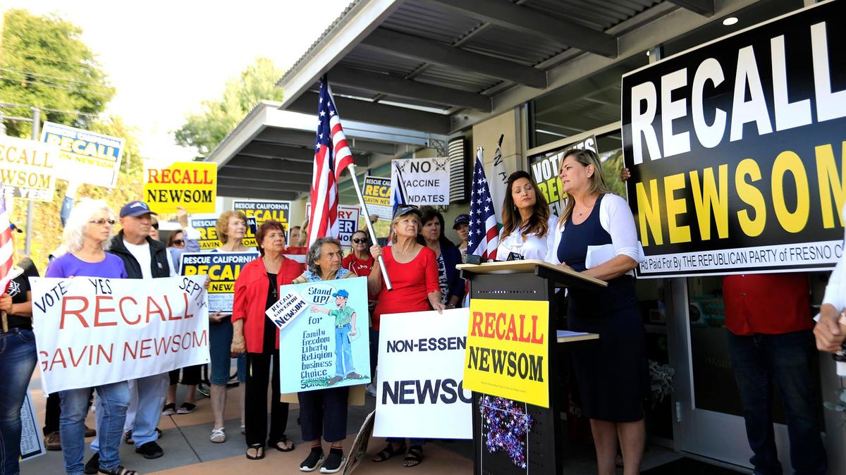 Angela Marsden, owner of Pineapple Hill Saloon & Grill in Sherman Oaks, speaks Sept. 9 during a rally in San Luis Obispo in support of Gov. Gavin Newsom’s recall. The group Rescue California met with a crowd at Dignified Hope Care as on one of several stops through California.