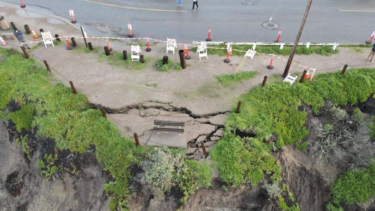 A crack on a Shell Beach bluff threatens to send the bench perched atop it into the ocean.