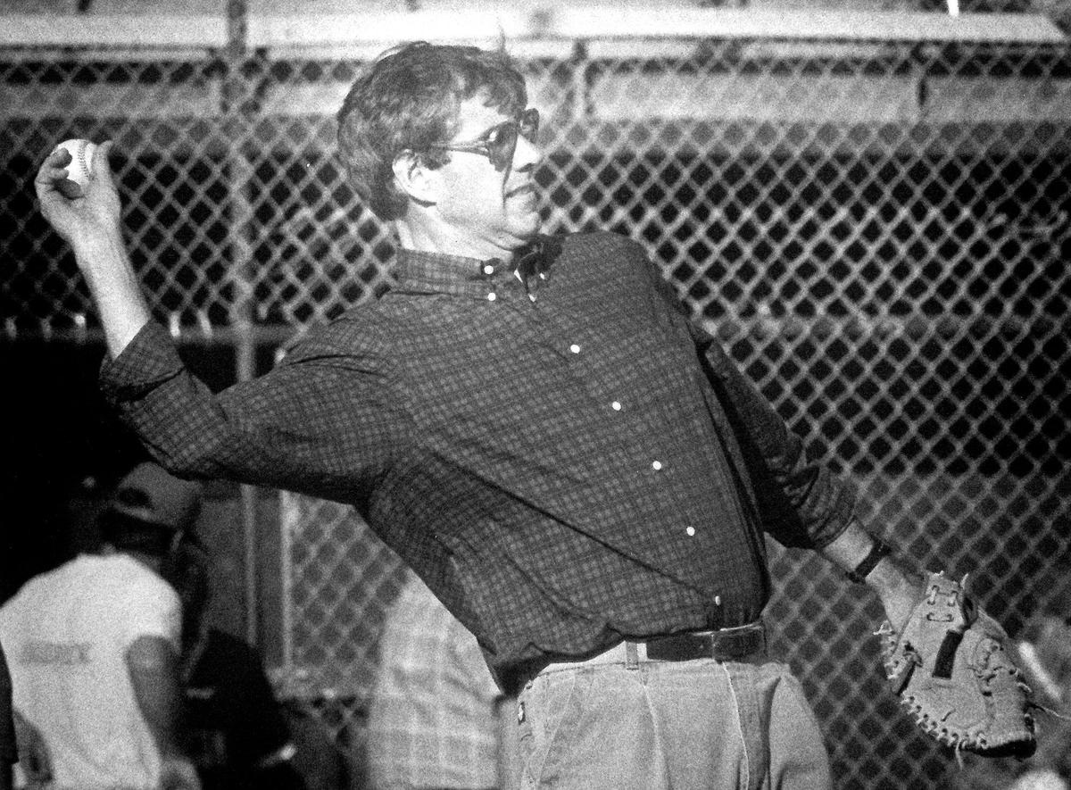 Warren Baker warms up his son, 13-year-old B.J. Baker between innings at a San Luis Obispo Babe Ruth baseball game. Published June 26, 1989 Eric Burdick/Telegram-Tribune