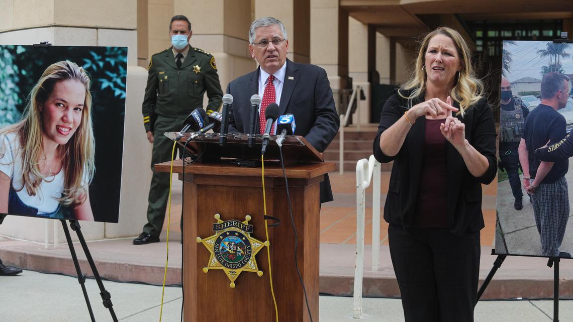 Cal Poly President Jeffrey Armstrong speaks at a news conference on Tuesday, April 13, 2021, announcing the arrests of Paul Flores and Ruben Flores in the disappearance of Cal Poly student Kristin Smart in 1996. San Luis Obispo County Sheriff Ian Parkinson stands in background and interpreter Robin Babb is at right. The photo at right shows Paul Flores being arrested at his home in San Pedro.