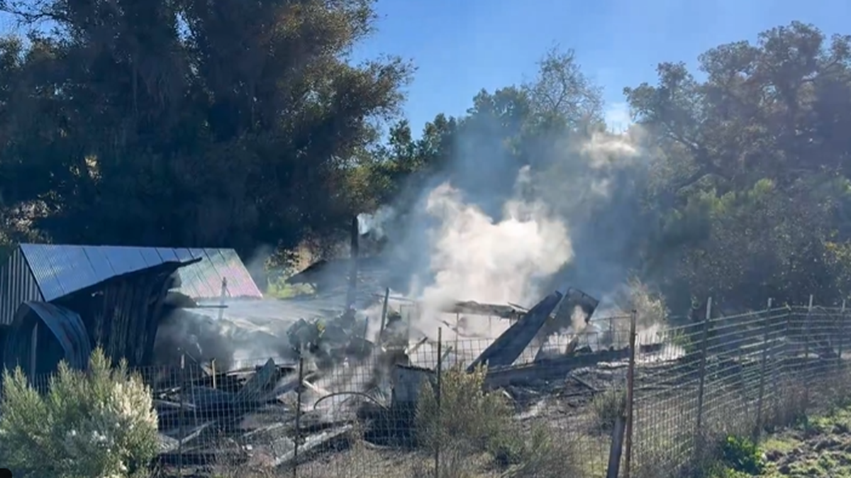 A fire destroyed an outbuilding and chicken coop on Dec. 8, 2025.