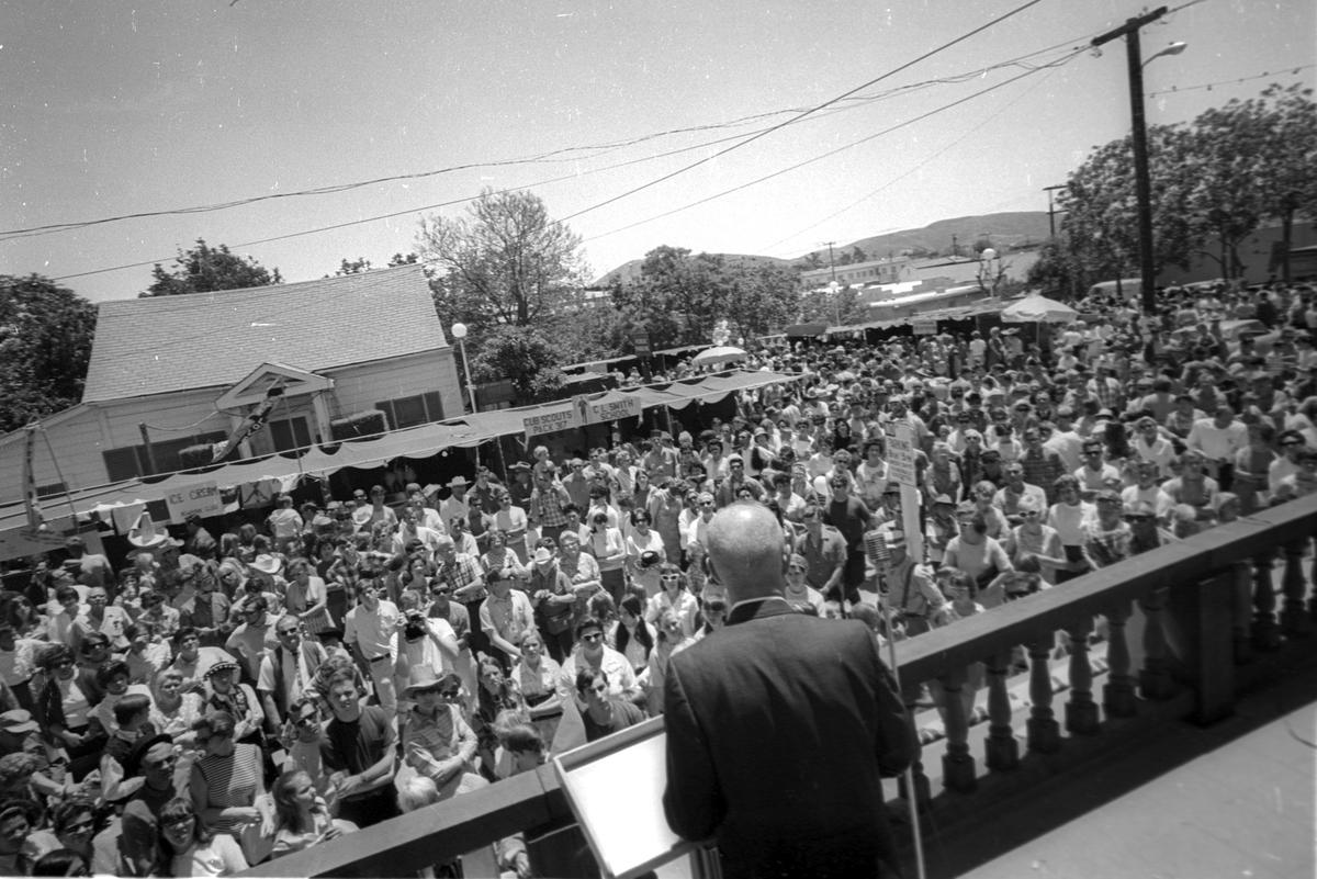 John Glenn visited San Luis Obispo May 18, 1968 during La Fiesta. Here, he speaks from the side of Mission San Luis Obispo de Tolosa to a crowd on Monterey Street as he campaigns for Robert F. Kennedy’s presidential bid.