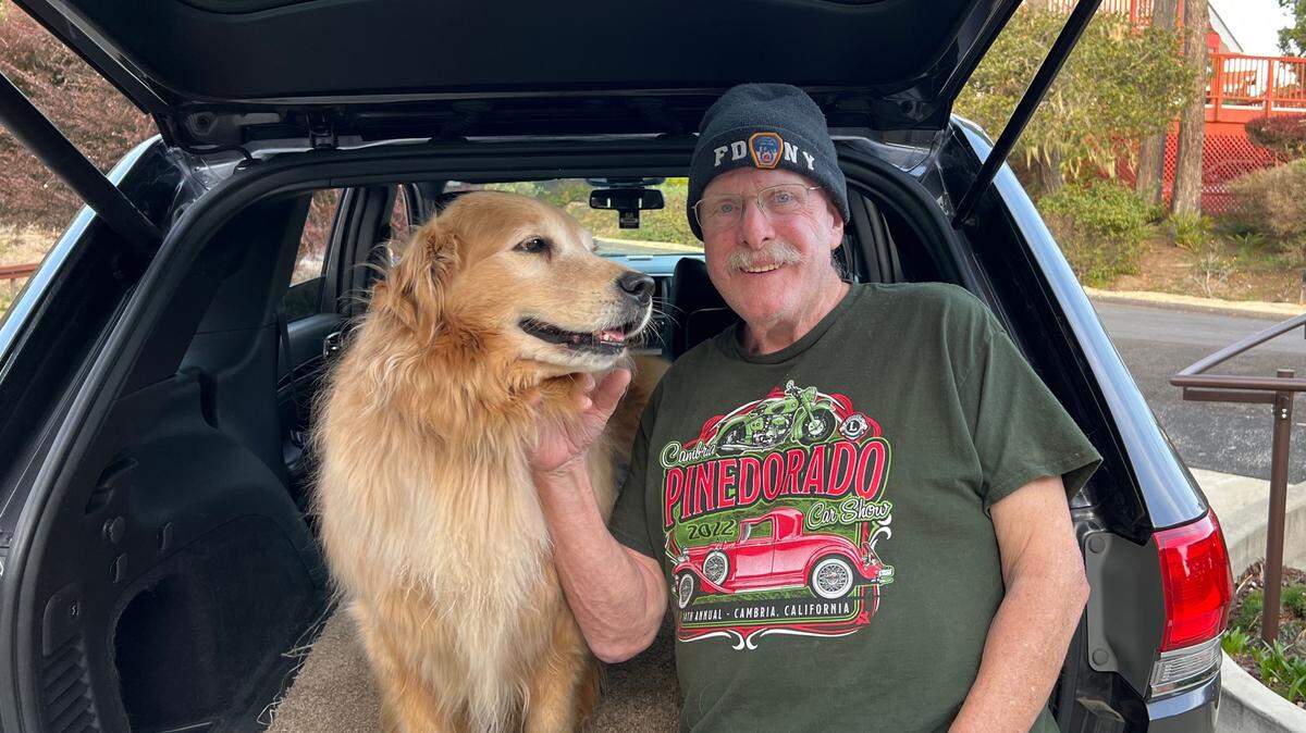 Michael Walsh of Cambria and his 8-year-old golden retriever Rebel sit in the vehicle in which the pup was confined for hours in late October 2022, while his master was being examined in the French Hospital emergency room for what the thought would be a quick visit. When it turned out he needed to stay at the hospital a few days, nurse Elissa Molfino came to their rescue.