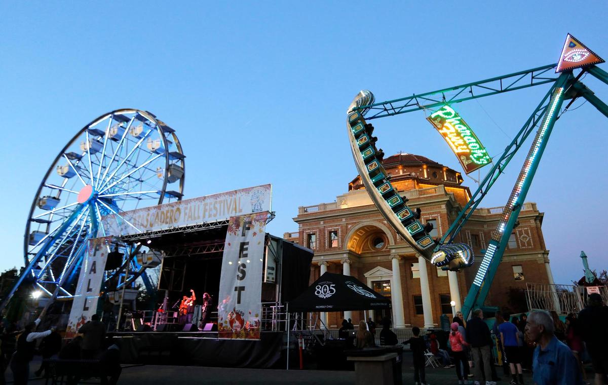 Thousands of people thronged to the Atascadero Fall Festival on Saturday, Nov. 19, 2022. The festival returned to the Sunken Gardens with carnival rides, games, live music, food and beer.
