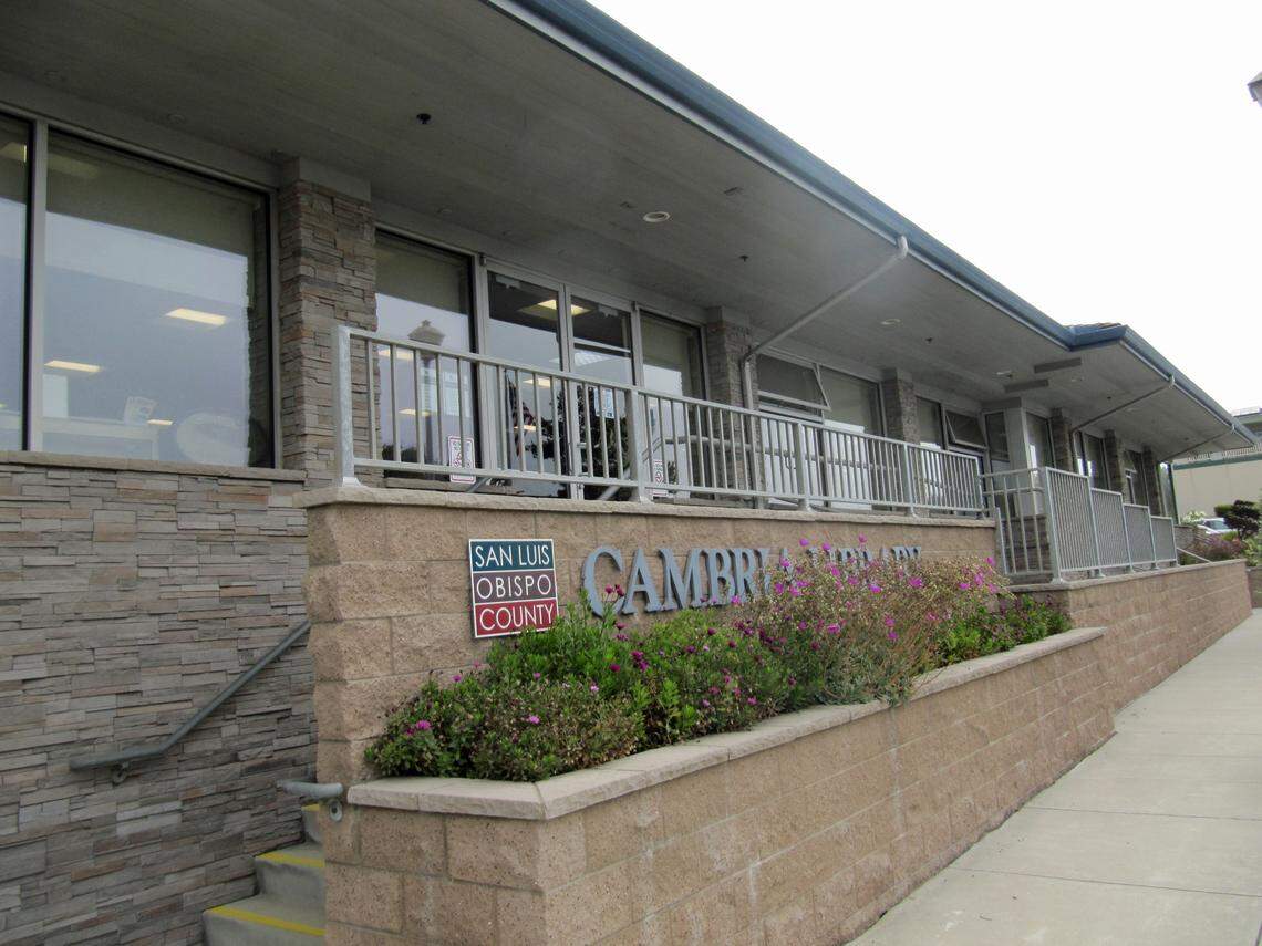 Bright flowers and masonry provide a welcome entry to the latest iteration of the Cambria Public Library, currently celebrating its 100th anniversary year.